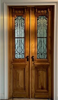 Reclaimed wood door-Top Custom Home Design Trends for 2025-Richardson Homes-Fort Myers-232x400jpg