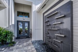 Waterfall feature-Top Custom Home Design Trends for 2025-Richardson Homes-Fort Myers-600x400jpg