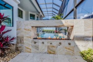 Travertine fire feature-Best Stone Options For Luxury Custom Homes In SW Florida-Richardson Homes-Fort Myers-600x400jpg